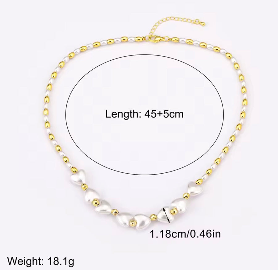 Heart shaped synthetic pearl necklace with 18K gold plated beads and adjustable chain
