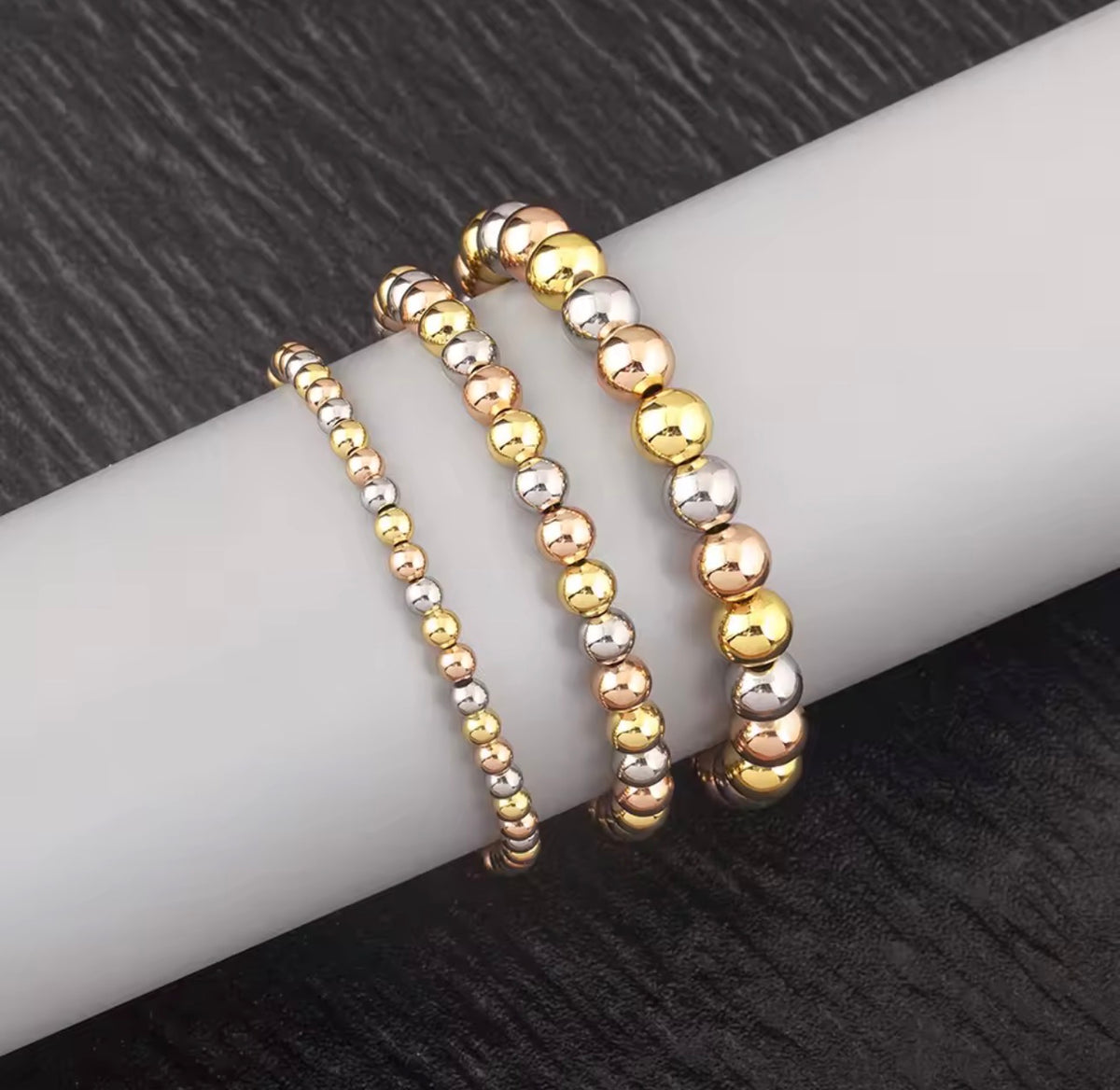 Three-tone beaded necklace with gold silver-tone and rose gold-tone round beads available in 4mm 6mm and 8mm sizes