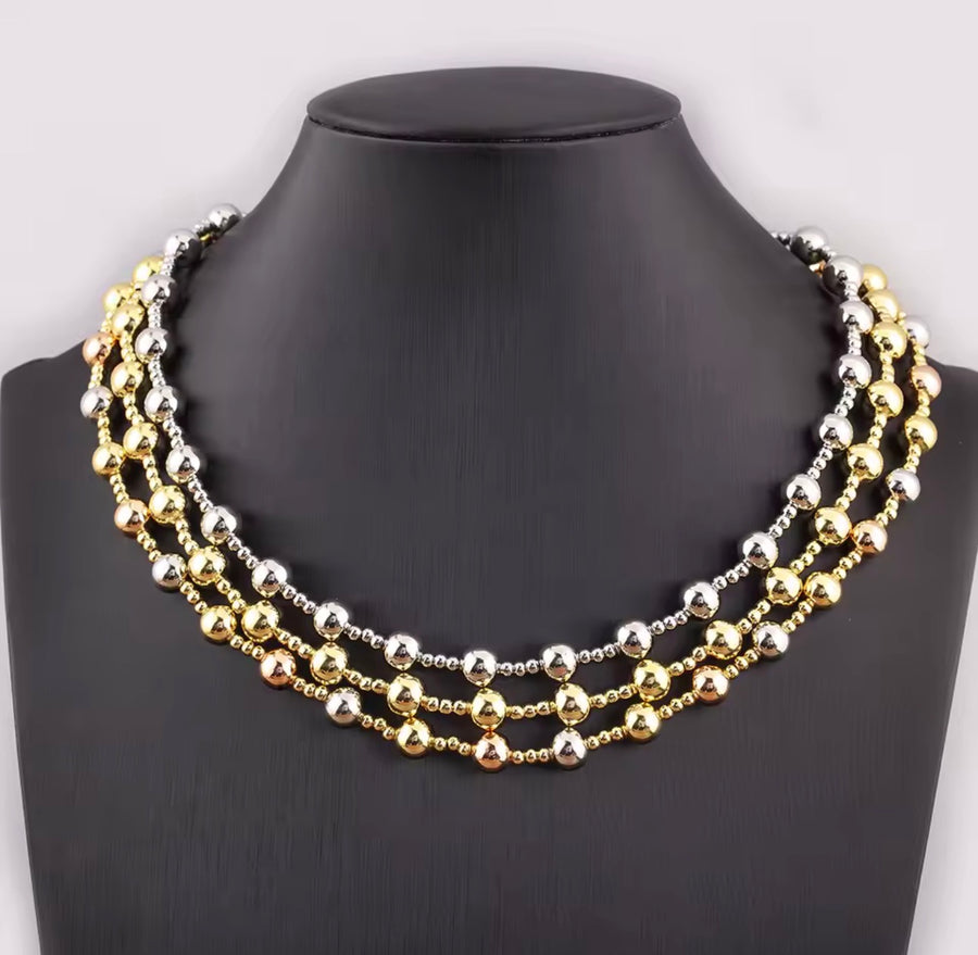 Gold silver-tone and three-tone 18K gold plated beaded necklaces available in 6mm and 8mm bead sizes