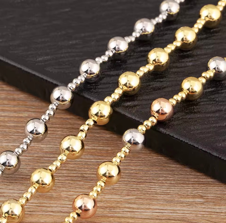 Gold silver-tone and three-tone 18K gold plated beaded necklaces available in 6mm and 8mm bead sizes