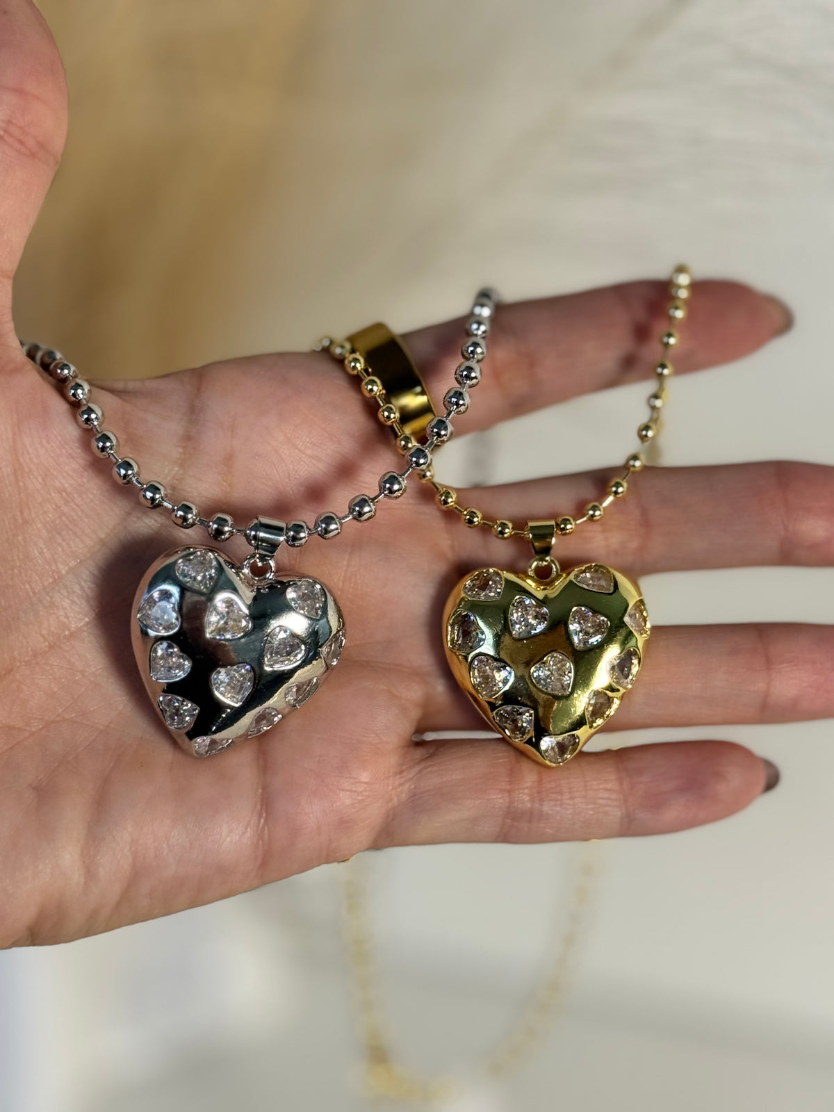 Silver-tone heart pendant necklace with heart-shaped cubic zirconia stones and 3mm beaded chain
