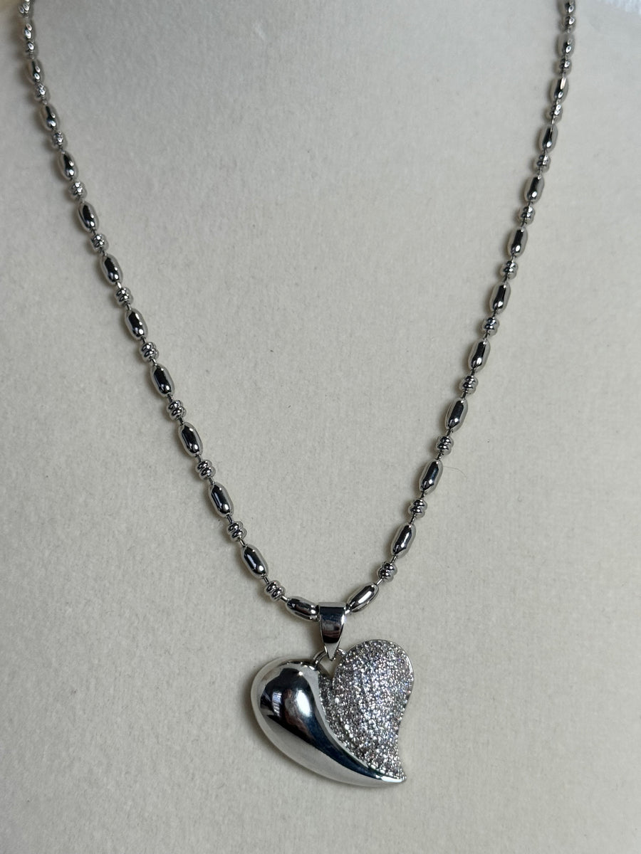 Silver-tone 18K gold plated heart pendant necklace with half pavé cubic zirconia design and textured oval bead chain