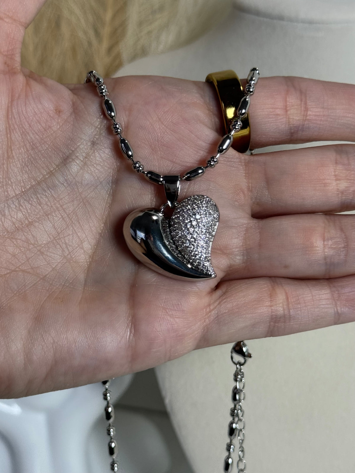 Silver-tone 18K gold plated heart pendant necklace with half pavé cubic zirconia design and textured oval bead chain
