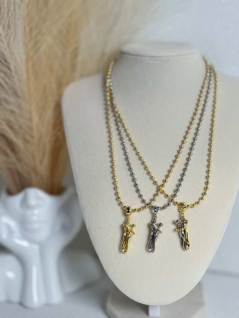 18K gold plated 3mm beaded necklace with hugging couple motion pendant in gold, silver-tone and two-tone