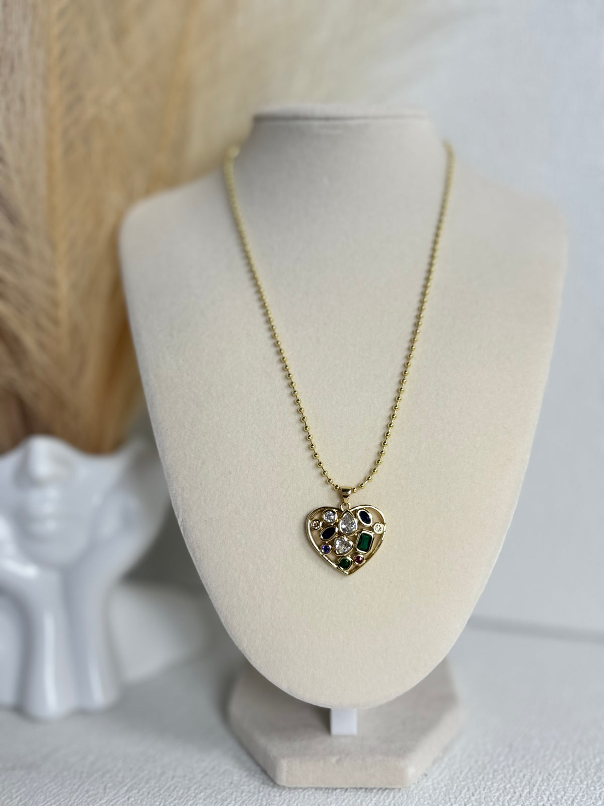 18K gold plated multicolor stone heart pendant necklace with colorful green blue purple pink and clear stones on a 2mm beaded chain