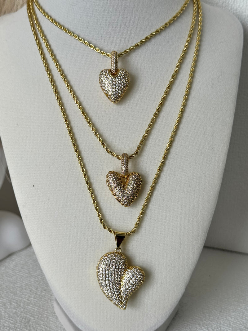 Three 18K gold plated rope chain necklaces with sparkling pavé zirconia heart pendants in different styles