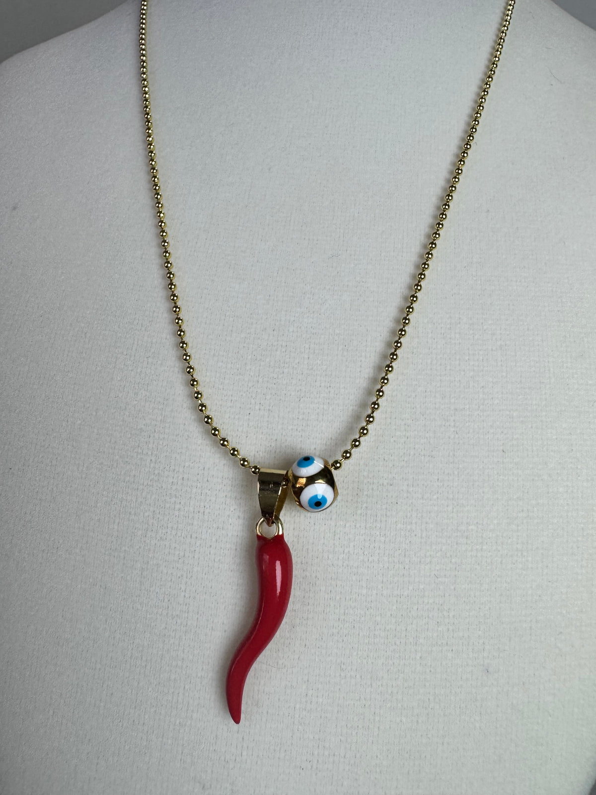 Red and gold cornicello horn necklaces with eye-detail beads on 18K gold plated 1.5mm chains