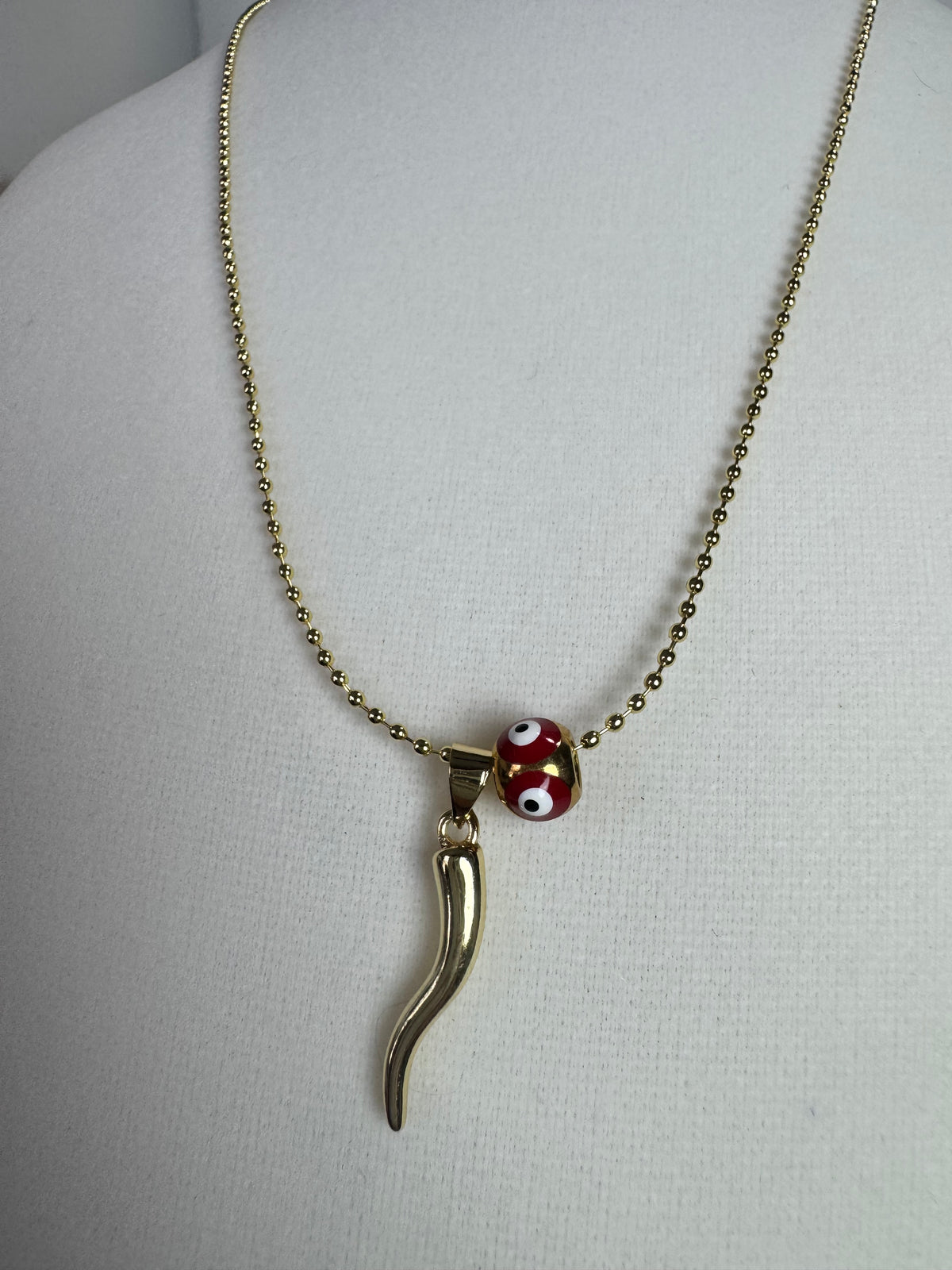 Red and gold cornicello horn necklaces with eye-detail beads on 18K gold plated 1.5mm chains