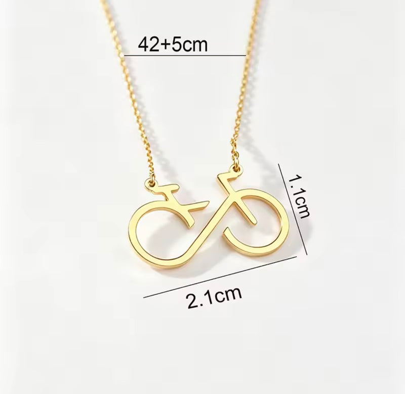 Infinity bicycle pendant necklace in stainless steel available in gold and silver
