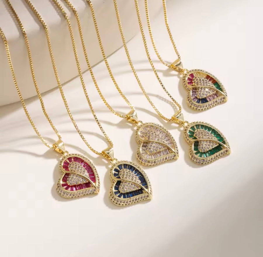 Gold tone double heart zirconia necklace with colorful baguette stones